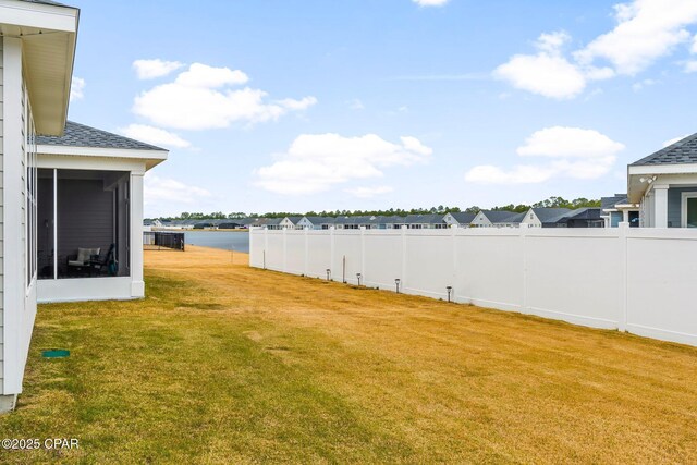 view of yard with a water view