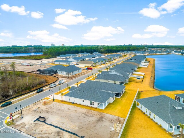 drone / aerial view with a water view