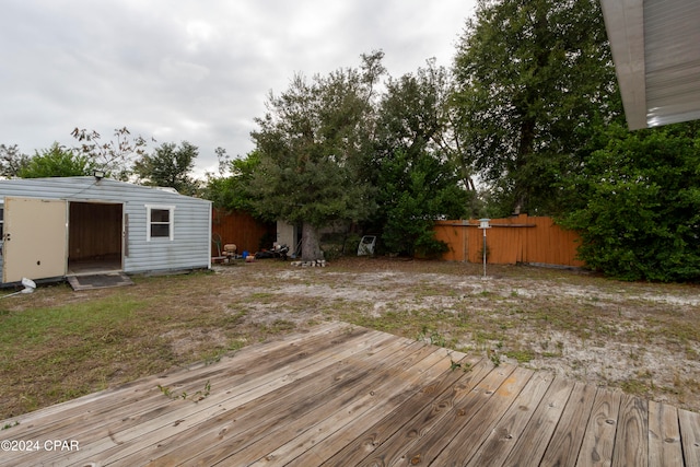 deck with a storage shed