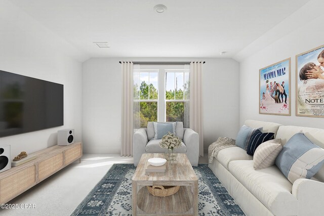 spare room featuring light hardwood / wood-style floors and a healthy amount of sunlight