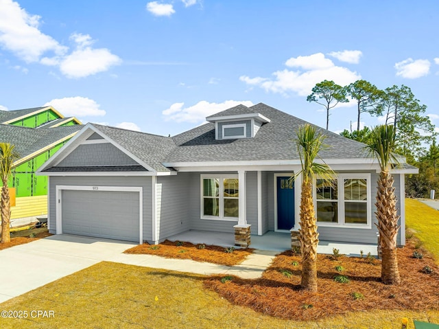 view of front of property with a garage