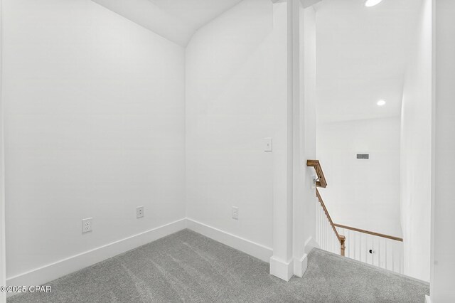 unfurnished room featuring carpet flooring