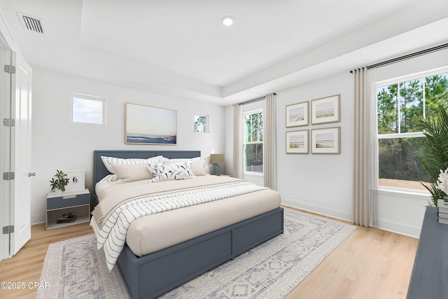 bedroom with light wood-type flooring