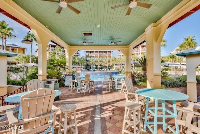 view of patio / terrace featuring ceiling fan