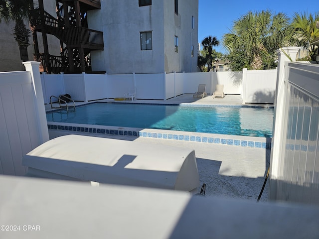 view of pool with a patio