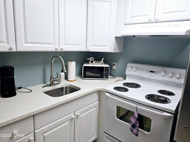 kitchen featuring light stone counters, sink, white cabinets, and white range with electric stovetop