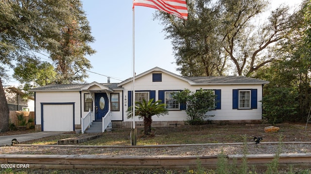 ranch-style home with a garage