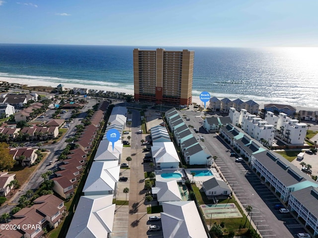 bird's eye view featuring a beach view and a water view