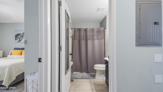 bathroom featuring a shower with shower curtain, electric panel, tile patterned floors, toilet, and connected bathroom