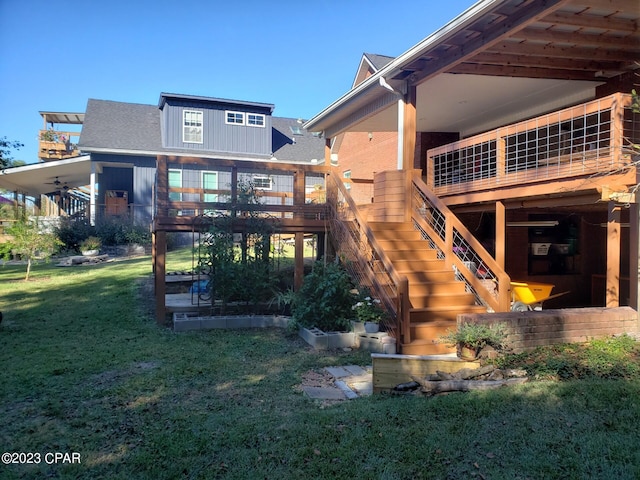 back of house featuring a lawn