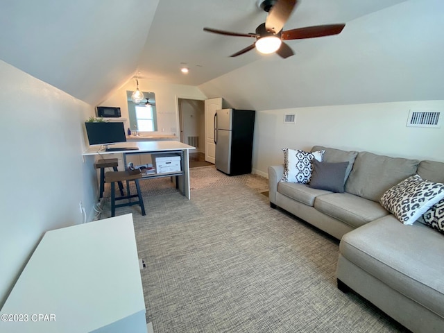 living room with light carpet, vaulted ceiling, and ceiling fan