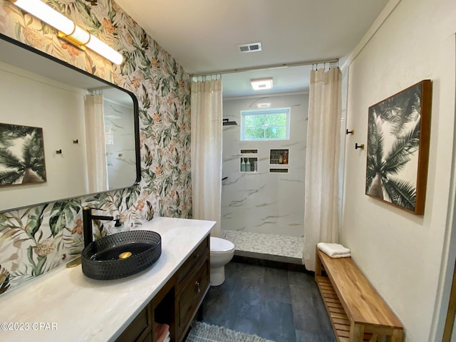 bathroom with a shower with shower curtain, vanity, tasteful backsplash, and toilet