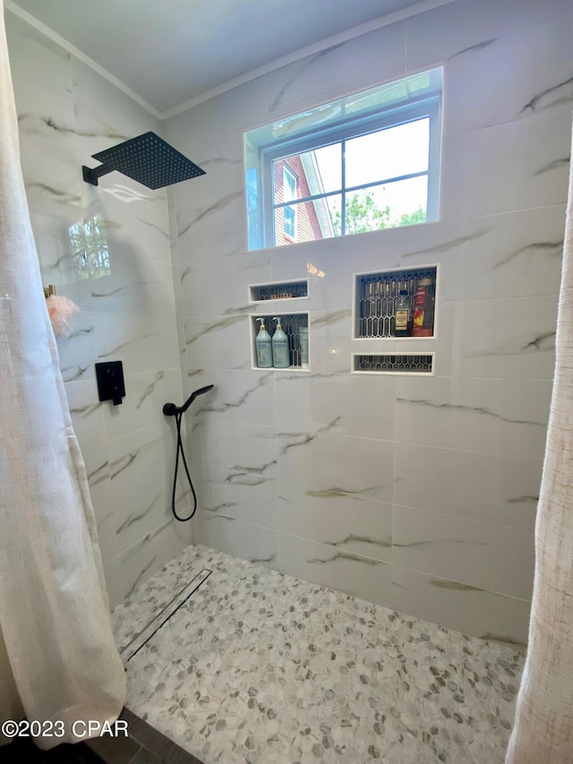 bathroom with a shower with shower curtain