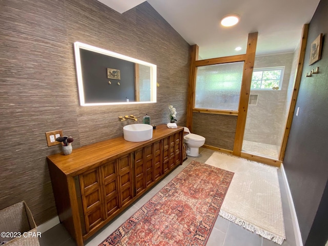 bathroom with tile patterned floors, vanity, and toilet