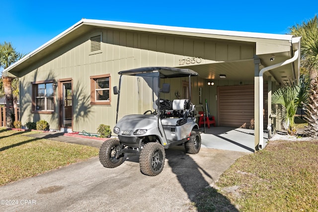 exterior space featuring a carport