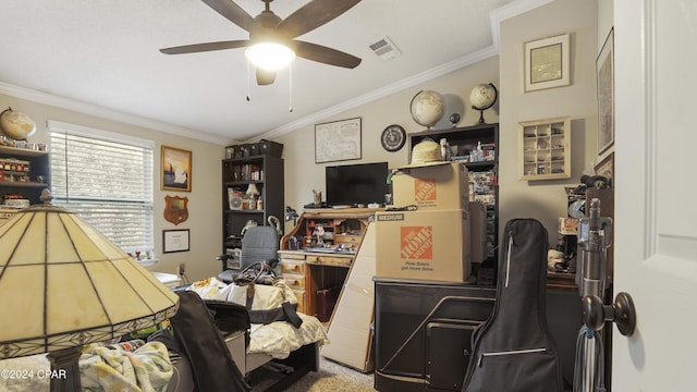 carpeted office space with ornamental molding, lofted ceiling, and ceiling fan