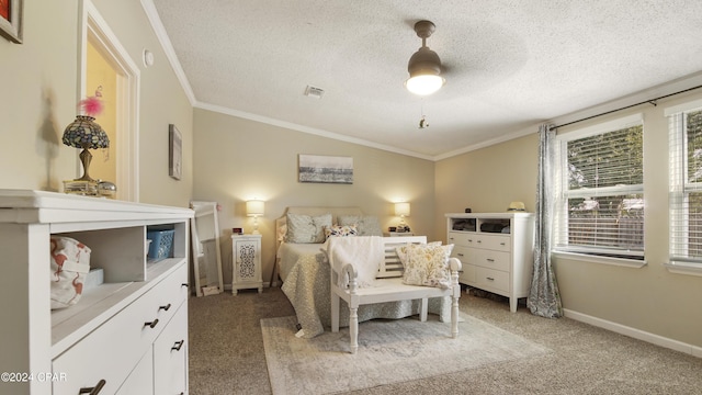 bedroom with ceiling fan, ornamental molding, a textured ceiling, and carpet