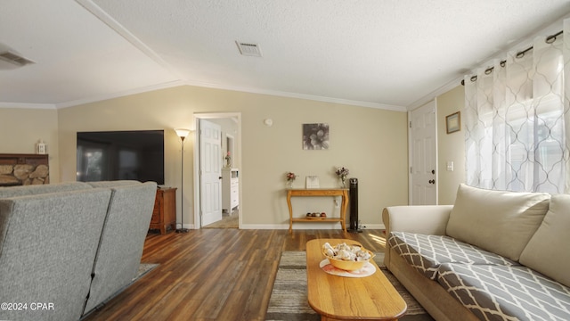 living room with dark hardwood / wood-style flooring, crown molding, lofted ceiling, and a textured ceiling