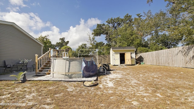 view of yard with a patio area and a shed