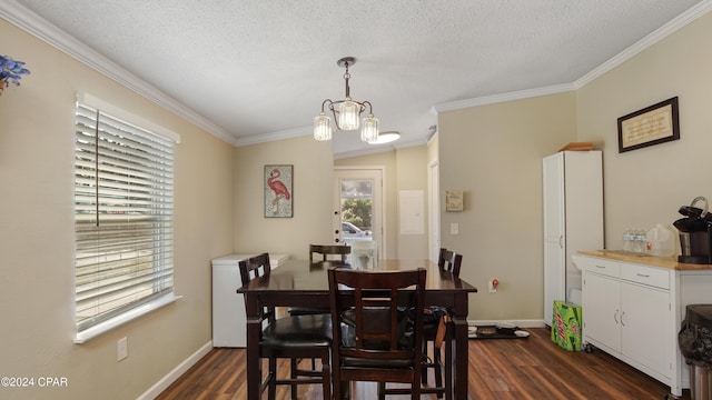 dining area featuring ornamental molding, dark hardwood / wood-style floors, a notable chandelier, and a textured ceiling