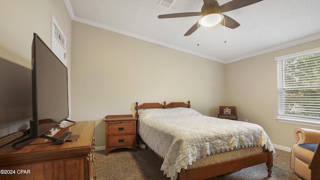 carpeted bedroom featuring ceiling fan and ornamental molding