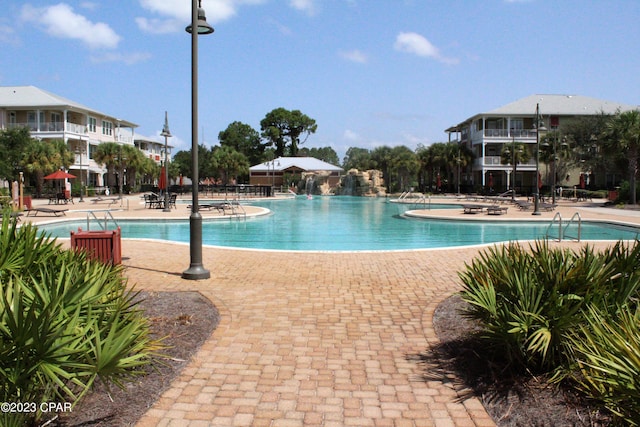 view of pool featuring a patio