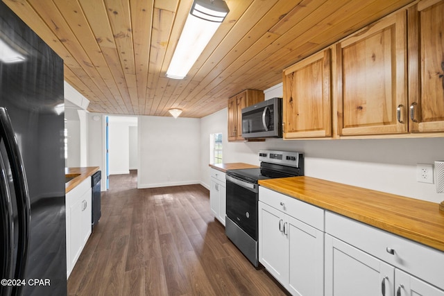 kitchen featuring white cabinets, butcher block countertops, black appliances, and dark hardwood / wood-style floors