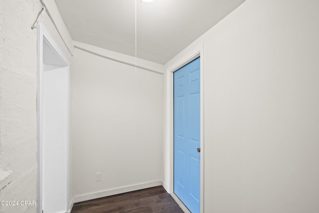 interior space with dark hardwood / wood-style flooring