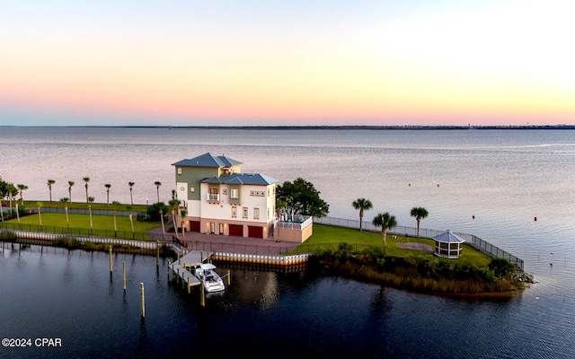 property view of water with a dock