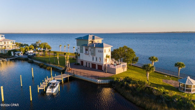 property view of water with a dock