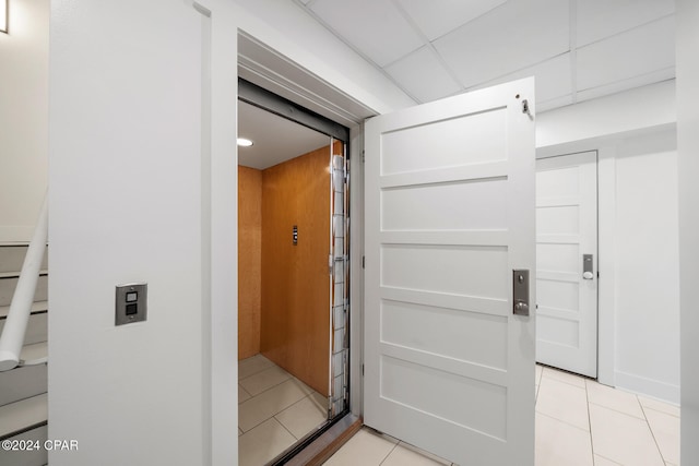 interior space with tile patterned floors