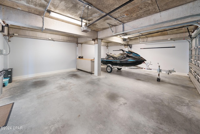 garage featuring a garage door opener