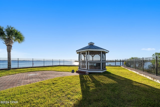 view of yard with a water view and a gazebo