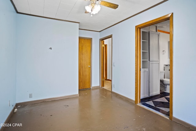 spare room featuring concrete flooring, ceiling fan, and crown molding