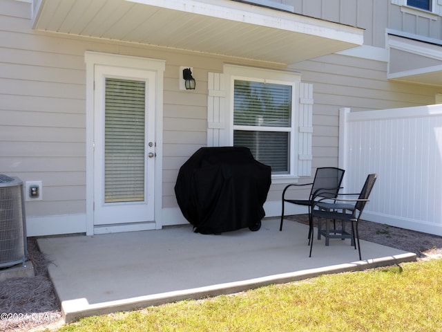 view of patio / terrace featuring grilling area and central AC unit