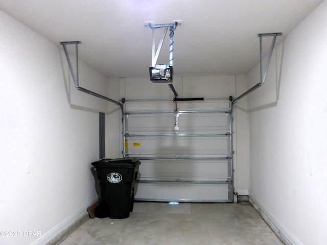 garage featuring a garage door opener