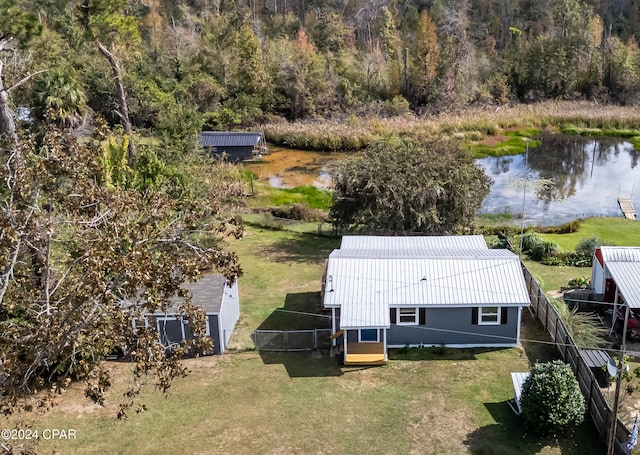 drone / aerial view with a water view