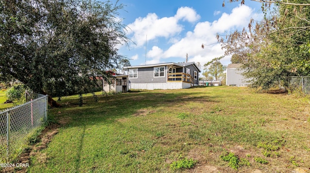 view of yard with a storage shed