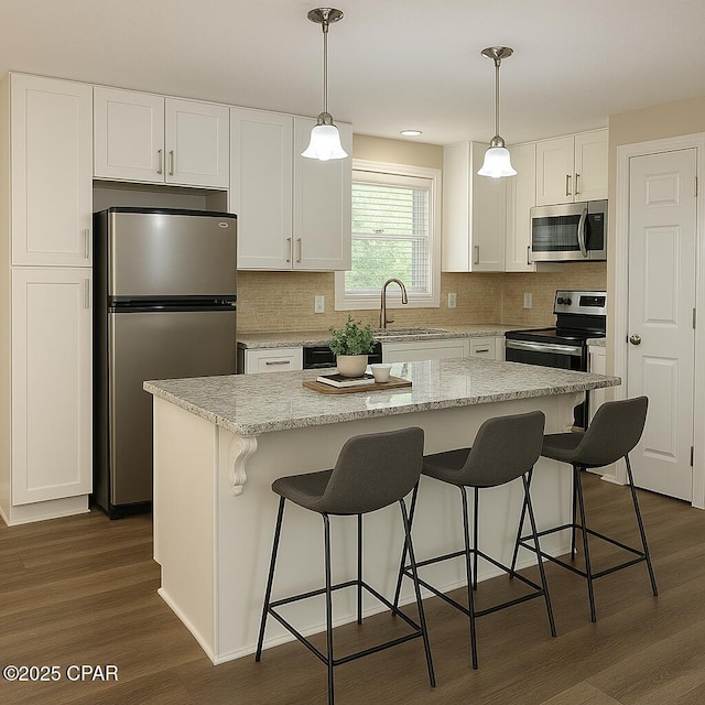 2849 Miltonia Ave, Marianna, FL 32448 - kitchen featuring appliances with stainless steel finishes, dark wood-style floors, white cabinets, and backsplash