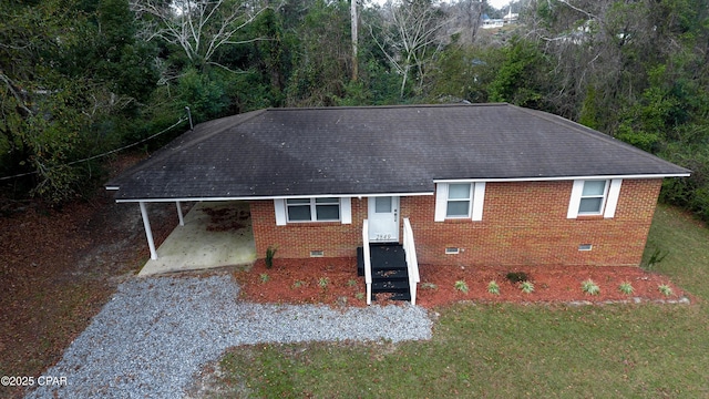 2849 Miltonia Ave, Marianna, FL 32448 - ranch-style home featuring crawl space, a shingled roof, and a front lawn