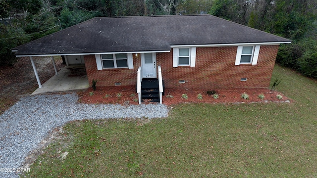 2849 Miltonia Ave, Marianna, FL 32448 - single story home with crawl space, a shingled roof, a front lawn, a carport, and driveway