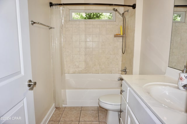 full bathroom featuring toilet, shower / bath combo, vanity, and tile patterned flooring