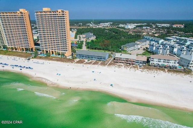 bird's eye view with a beach view and a water view