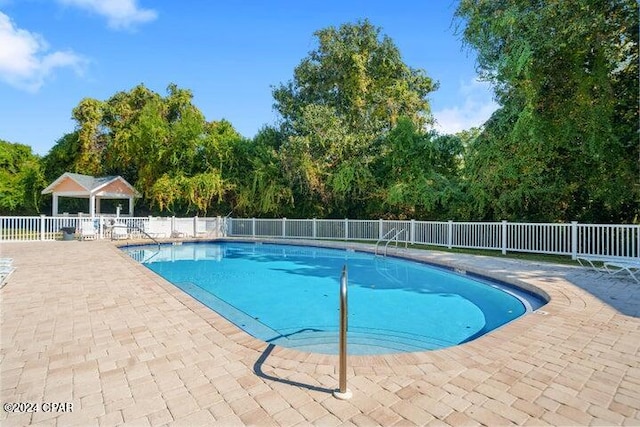 view of pool with a patio