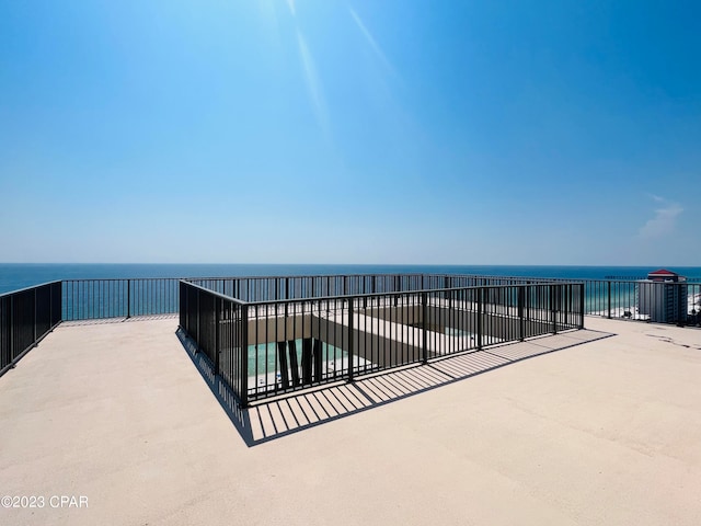 view of patio / terrace featuring a water view