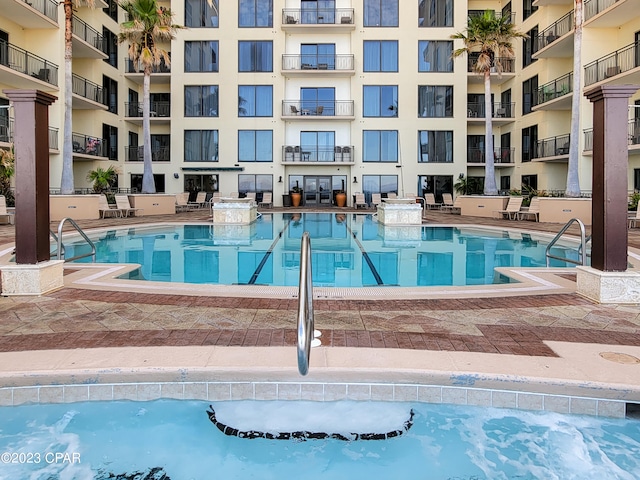 view of swimming pool featuring a patio