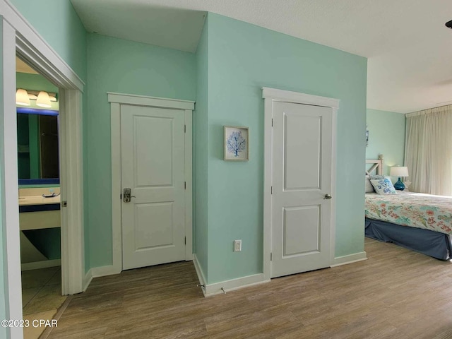 bedroom featuring hardwood / wood-style flooring