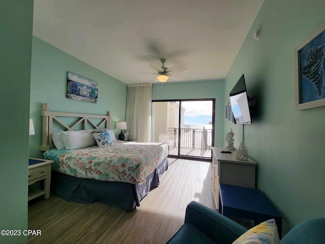 bedroom featuring access to outside, light hardwood / wood-style flooring, and ceiling fan