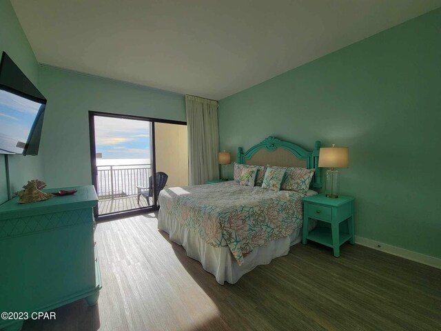15100 Front Beach Rd Unit 1604, Panama City Beach, FL 32413 - bedroom with access to exterior, wood finished floors, and baseboards