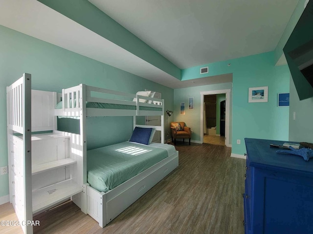 bedroom featuring hardwood / wood-style flooring